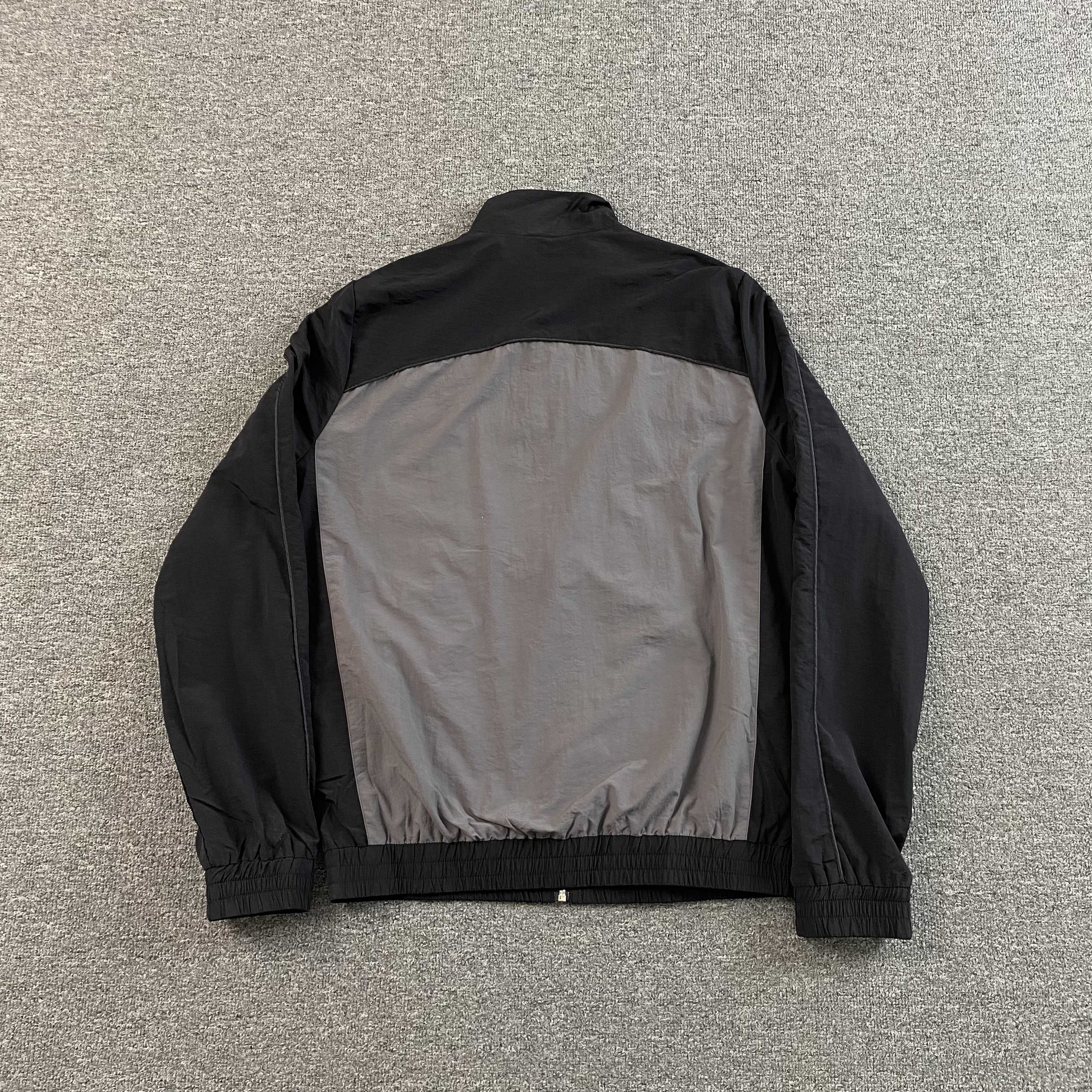 SYNA WORLD LOGO SHELL JACKET