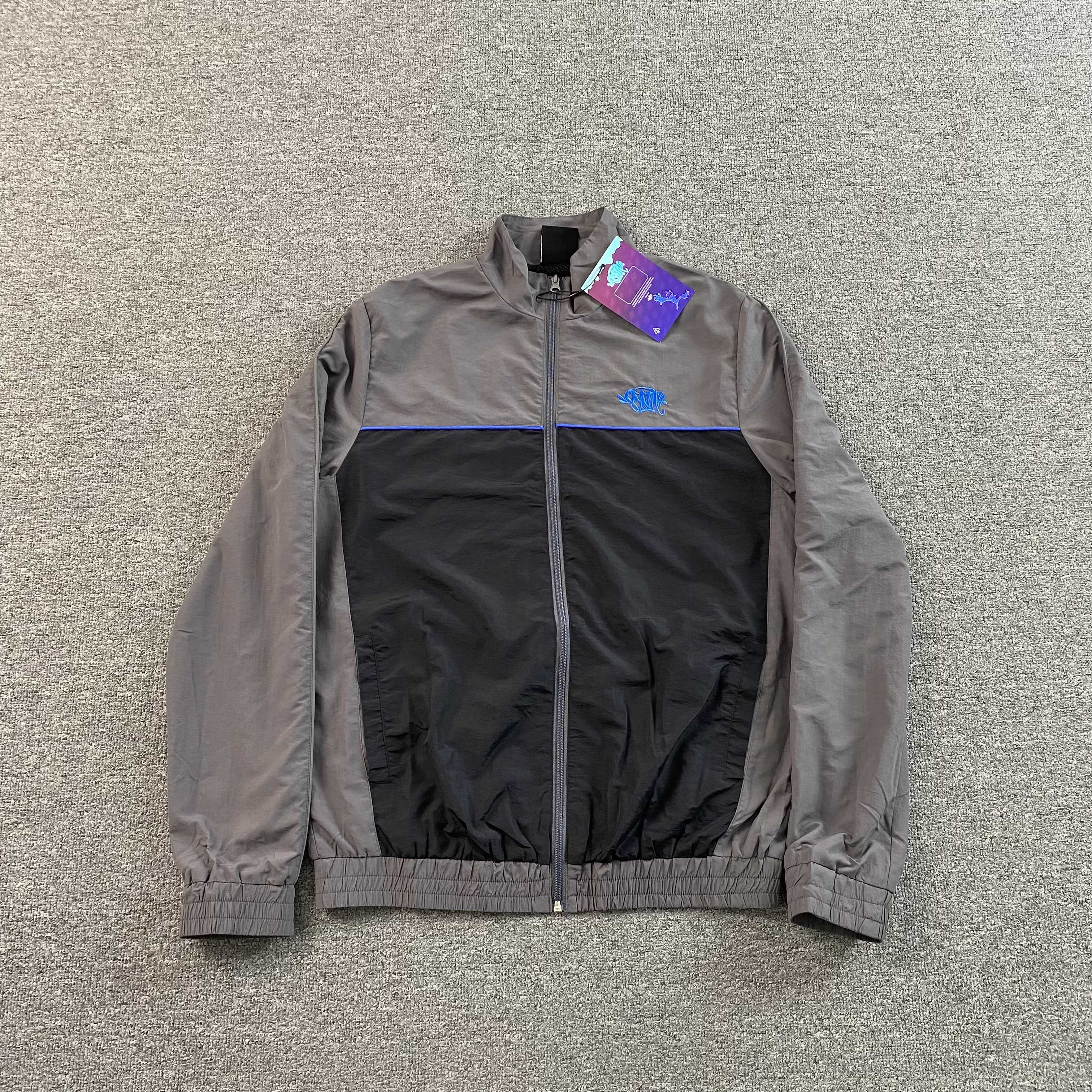 SYNA WORLD LOGO SHELL JACKET