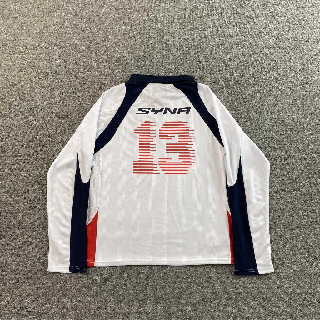 SYNA WORLD DVL FOOTY V2 T SHIRT
