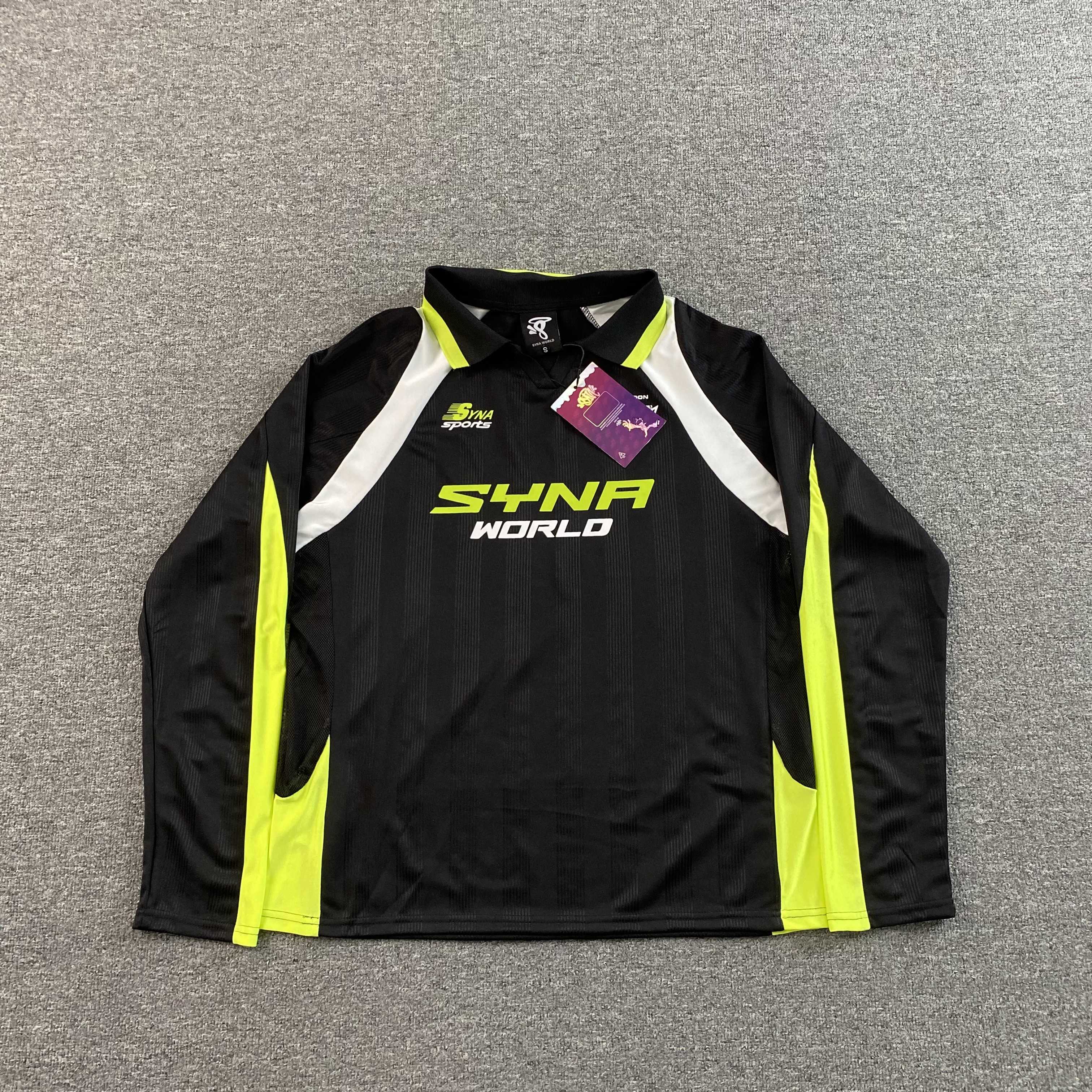 SYNA WORLD DVL FOOTY V2 T SHIRT