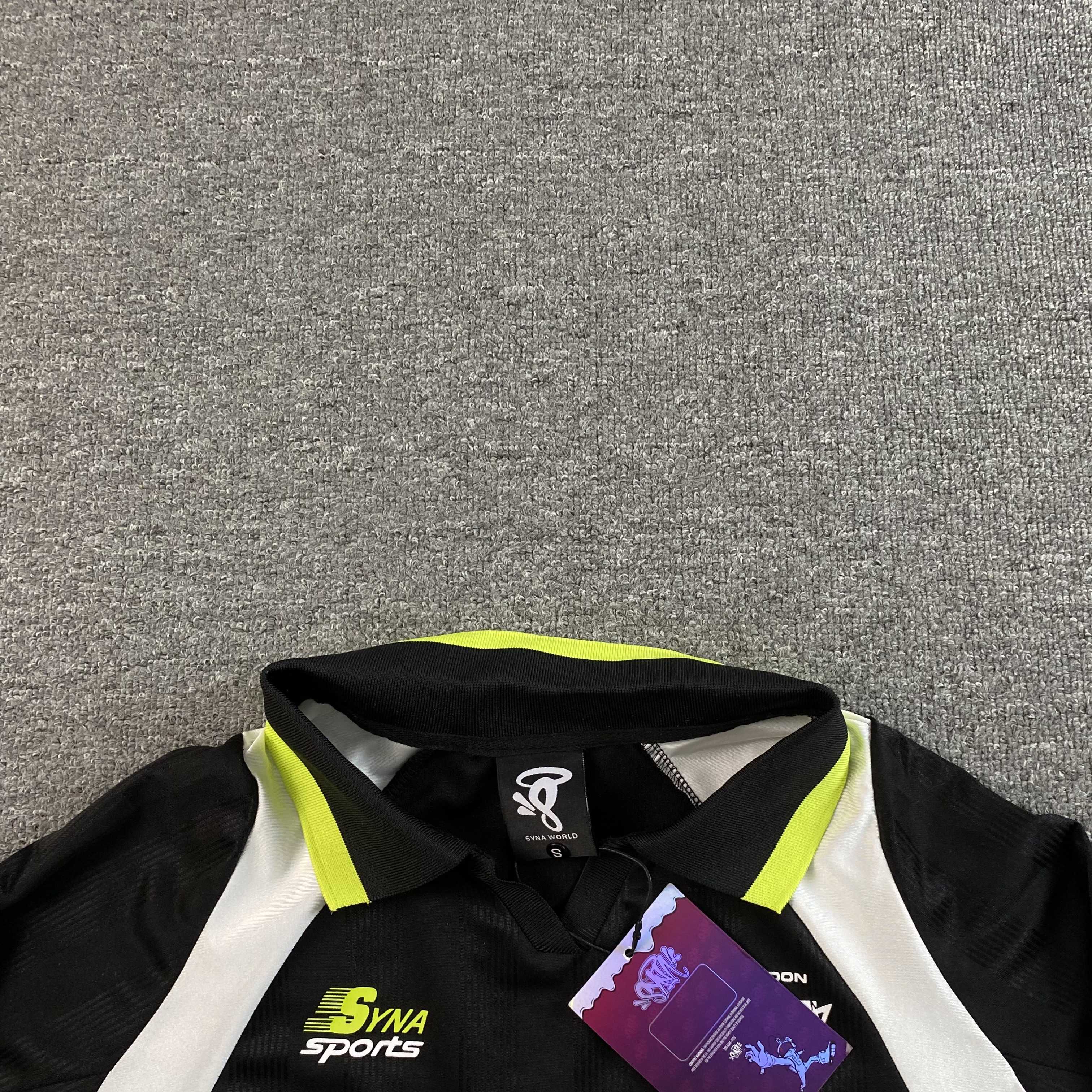 SYNA WORLD DVL FOOTY V2 T SHIRT